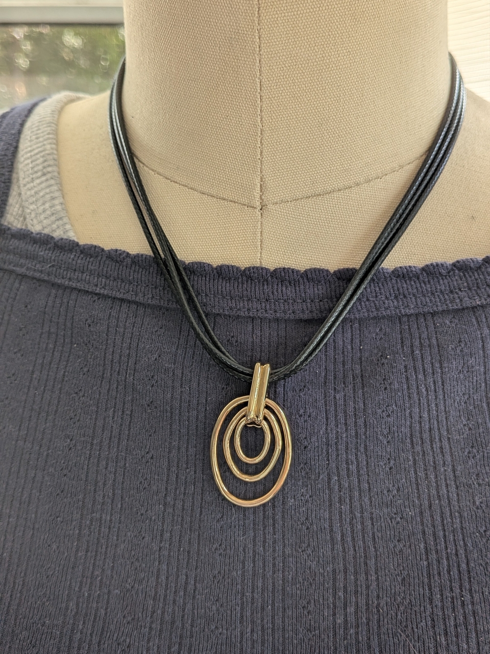Gold-Tone Multi-Oval Pendant Necklace with Black Multi-Strand Cord